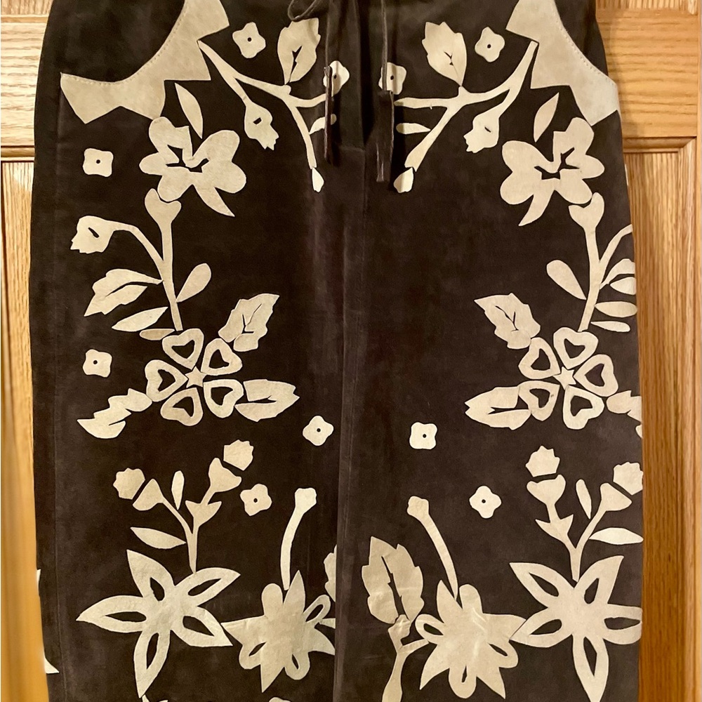Suede skirt with detailed suede inlays. Floral Patterned Skirt